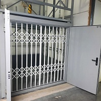 Грузовой подъёмник в металлокаркасной шахте, на 2 остановки, 1000 кг, Курган